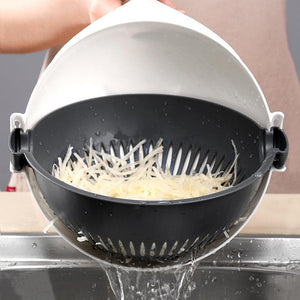 Multi-functional manual vegetable cutter with basket